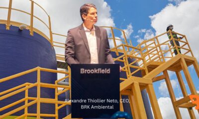 BRK Ambiental CEO Alexandre Thiollier Neto speaks at Brookfield podium with sanitation infrastructure in background, highlighting Brazil’s sanitation drive